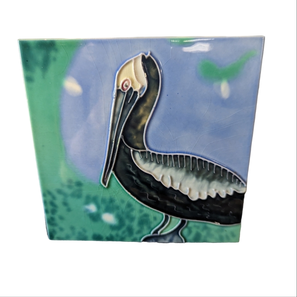Decorative tile with pelican